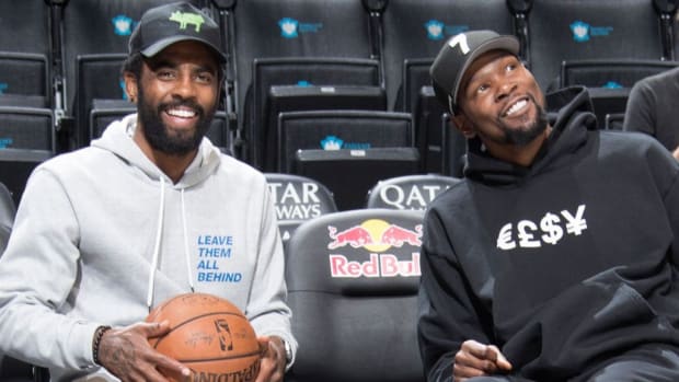 Inspiredlovers KYRIE-IRVING-AND-KEVIN-DURANT Kyrie Irving was blasted over Kevin Durant for wasting his... NBA Sports  NBA News Kyrie Irving Kevin Durant Brooklyn Nets 