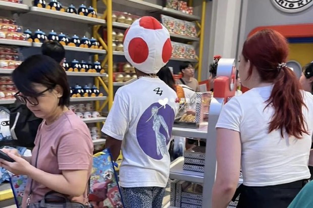 Inspiredlovers Lewis-Hamilton "Revving Up the Fun: Lewis Hamilton Takes Nintendo Fandom to the Next Level with Toad Hat Sighting in Japanese Store!" Boxing Sports  Lewis Hamilton Formula 1 F1 News 